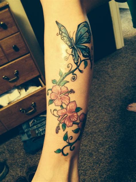 Check out our butterfly leg tattoo selection for the very best in unique or custom, handmade pieces from our shops. Butterfly and hibiscus flower leg tattoo | Love it ...