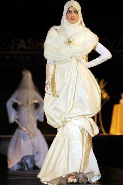 A Model Showcases The Creation Aroosah By A Malaysian Designer Syahirah During The Islamic