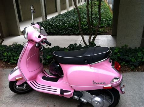 This vespa was firmly within the very early design era. Pink Vespa LX 150 2010 | Pink vespa, Vespa lx, Vespa scooters