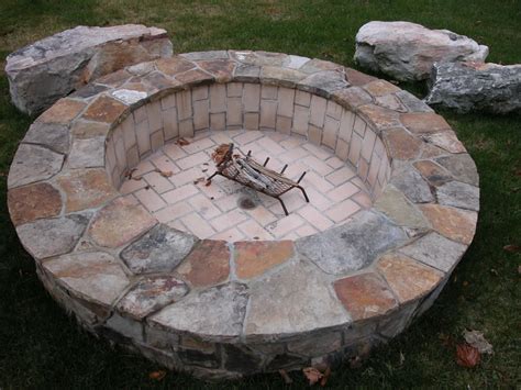 Many fire pits are a fire bowl supported on legs about 18″ tall. Fire-pits, Grills and Fireplaces - Landscape Associates Inc.