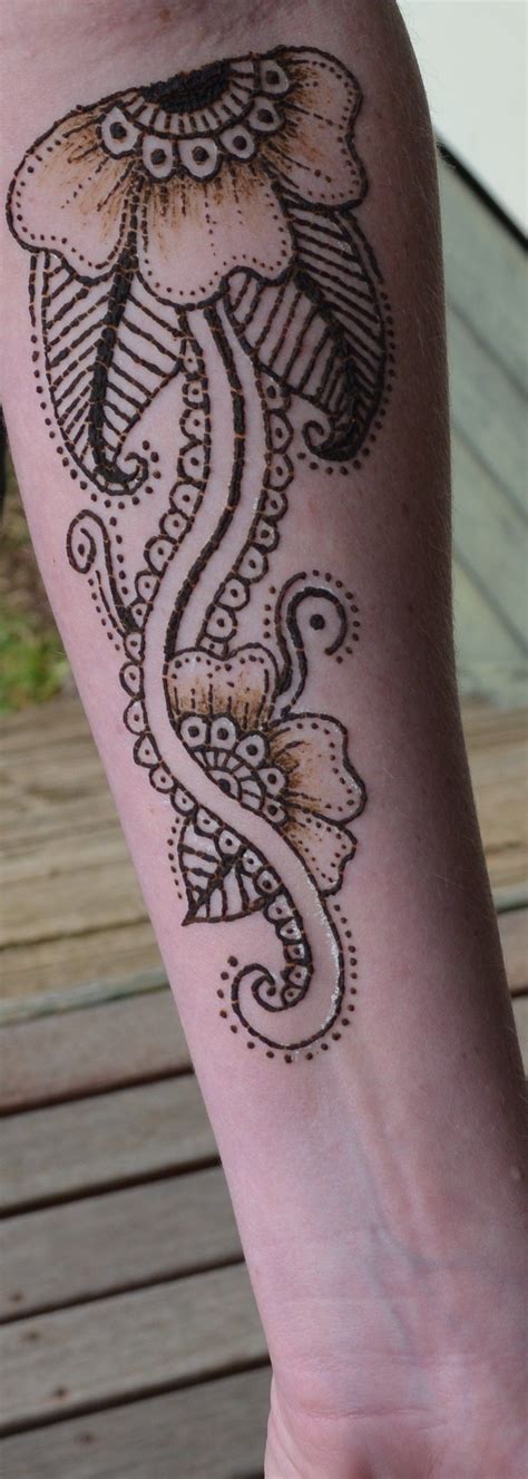 Maybe you would like to learn more about one of these? Henna Flower Tattoo. | Henna flowers tattoo, Henna designs, Tattoos