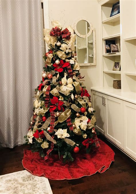 A unique gift to yourself and your dinner guests. Christmas tree. Plaid and gold ribbon. Bow tree topper ...
