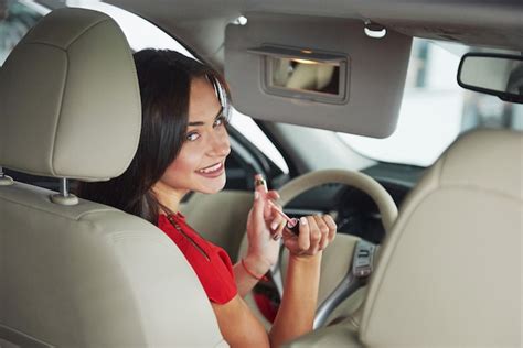 Premium Photo Woman In Car Indoor Looking At Passengers In Back Seat