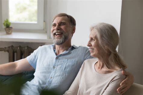 Cheerful Loving Retired Mature Couple Enjoying Leisure Dating At Home Stock Image Image Of