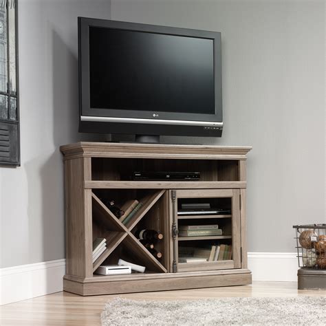 A corner tv stand should come in a functional design so that it gives you peace of mind. Sauder (414729) Corner Tv Stand | The Furniture Co.