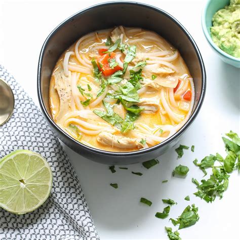 This cozy chicken curry soup is made with the most delicious creamy curry broth, and filled with tender chicken and your choice of veggies. Thai Curry Chicken Soup - The Petite Foodie Dinner