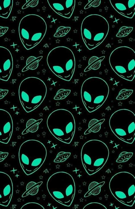 An Alien Pattern On A Black Background With Green Lights And Space