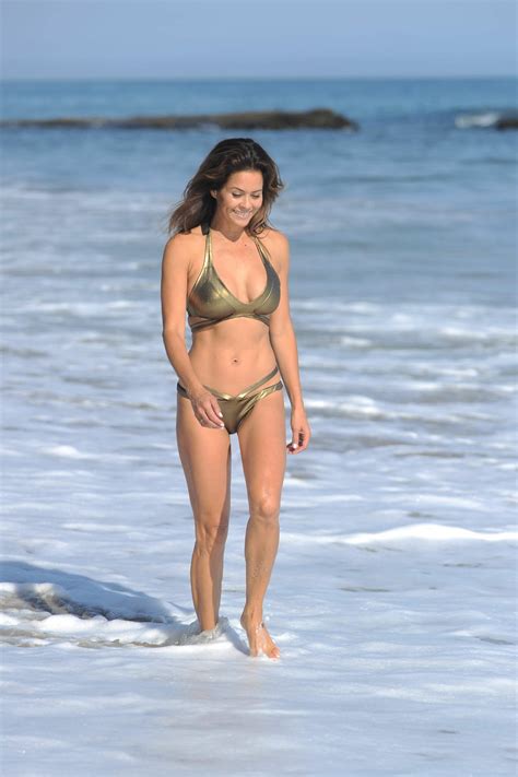 Milf Beauty Brooke Burke Stuns In A Golden Bikini On A Beach In Malibu