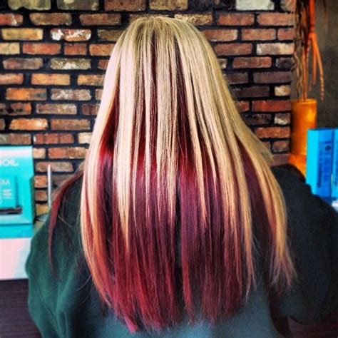 You should probably go to a hair dresser for this. Level 9 Blonde on top with Red underneath!