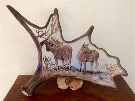 Detailed Moose Antler Carving Of Cow And Bull Moose Mounted On Burl