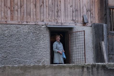 Slovenia Dobrna Prov Mother At Door To Stable Under The House 2006