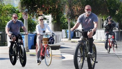 Arnold Schwarzenegger Enjoys Bicycle Ride With Girlfriend Poses For Selfies With Fans
