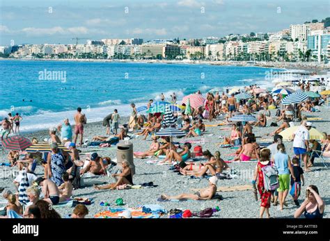 Nice France Beach Scene Crowd Scene Sunbathing On Vacation On