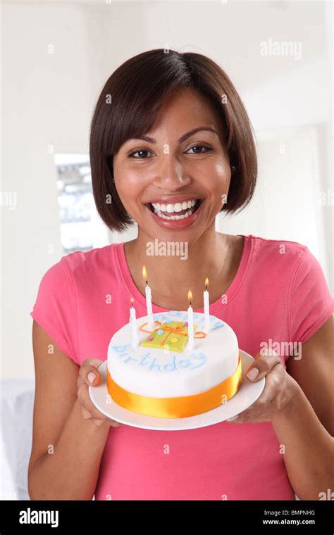 Woman With Birthday Cake Stock Photo Alamy