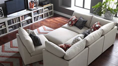 Sectional couches or sofas are a common type of seating found in living rooms and dens. Beckham Modular Sectional by Bassett - YouTube