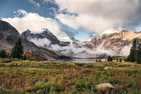 Premium Photo Mount Assiniboine With Foggy And Cloudy On Lake Magog