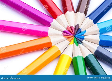 A Circle Of Sharpened Colored Pencils On A White Background Stock