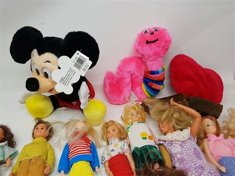 Lot Of Assorted Dolls And Stuffed Toys
