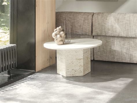Available individually, these tables can also be combines in a set of three to creates a delightful nesting coffee table experience. Gubi Epic White Travertine 31'' Wide Round Coffee Table | GUB10042386