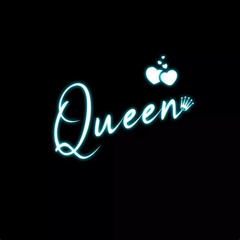 The Word Queen Is Lit Up In The Dark With An Apple On It S Side