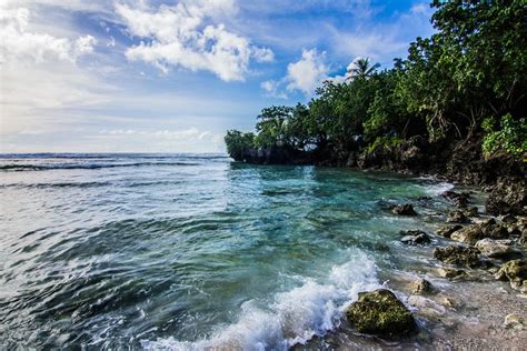 Tanguisson Beach By Tim Grey 500px Guam Travel Guam Beaches