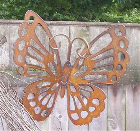 Adding butterflies to home decoration is excellent for adding romantic feel to modern interior design and feng shui homes. Decorative Rustic Butterfly Garden Stake (20" x 20.5 ...