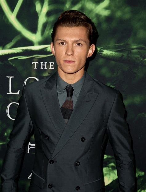 The cherry actor 25, could be seen holding zendaya's face closely as he leaned in to kiss the euphoria star, 24. Tom Holland In Emporio Armani - Lost City Of Z LA Premiere ...