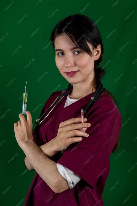 premium photo doctor nurse in medical mask and gloves holding syringe with vaccine typical