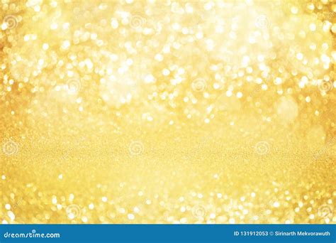 Abstract Gold Glitter Bokeh Lights With Soft Light Background Stock