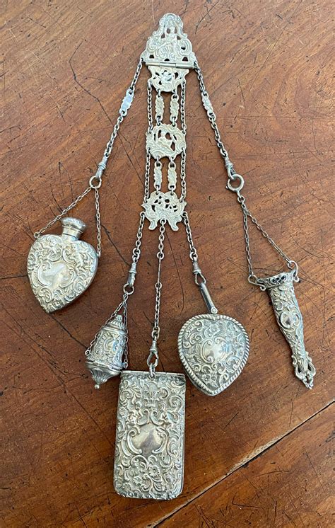 Lot A Victorian Sterling Silver Chatelaine Henry Matthews Birmingham And Chester 1886 1887