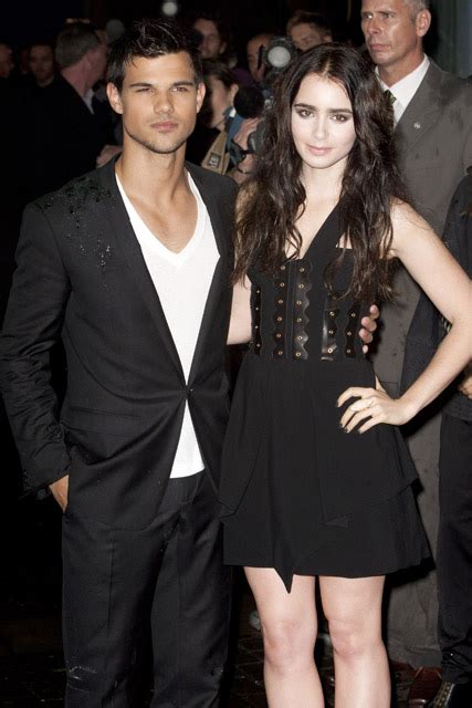 Taylor Lautner And Lily Collins Reunite At Abduction Premiere