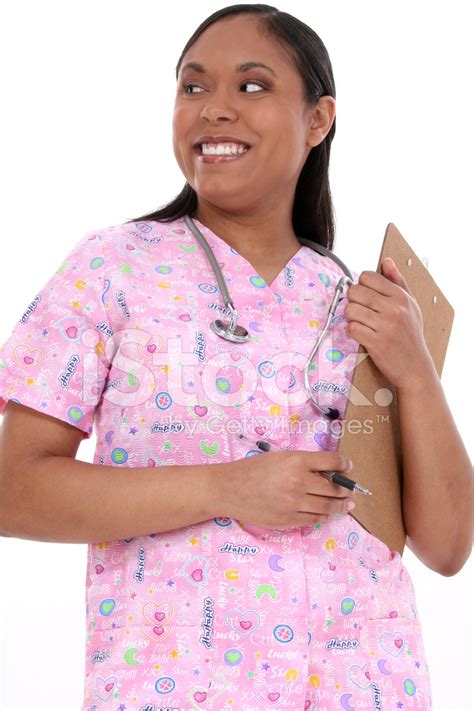 Beautiful Pediatric Nurse In Scrubs Stock Photo Royalty Free Freeimages