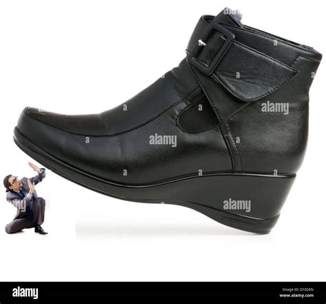Woman Domination Concept With Shoes And Man Stock Photo Alamy