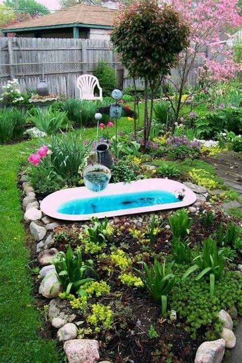 Since vintage tubs are small compared to an average garden plot, consider filling yours with your smaller, simpler garden items. Bathtub pond and fountain | Garden bathtub, Backyard ...