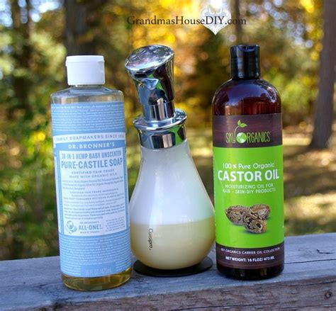 Add castile soap, coconut oil and essential oils to a foaming hand soap dispenser. DIY foaming hand soap recipe - my newest favorite money saver!