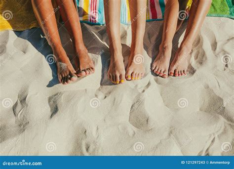Close Up Of Legs Of Three Women At The Beach Stock Image Image Of