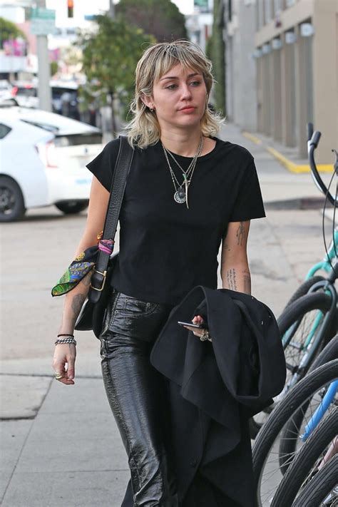 miley cyrus street style with black cotton tee