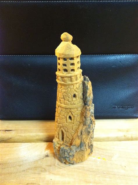 Lighthouse Amongst The Cliffs Dremel Carving Chainsaw Wood Carving