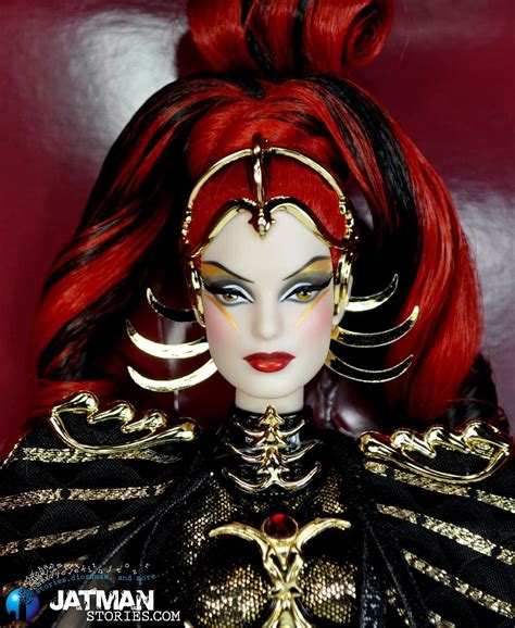 A Close Up Of A Doll With Red Hair And Make Up On Its Face