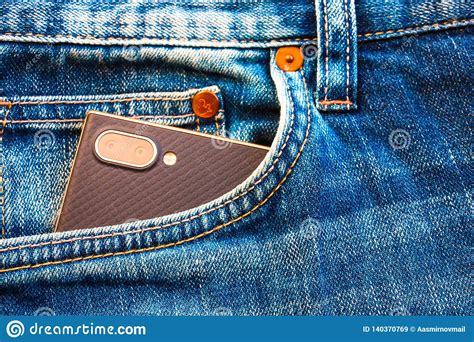 Smartphone With Camera In Blue Jeans Pocket Stock Image Image Of Back