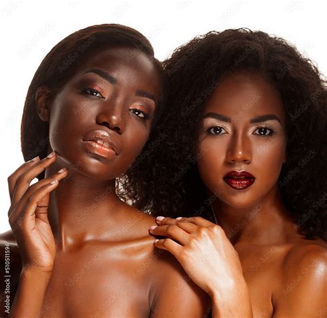 Beauty Portrait Of Two Attractive Young Half Naked African Women With Glamour Make Up Stock