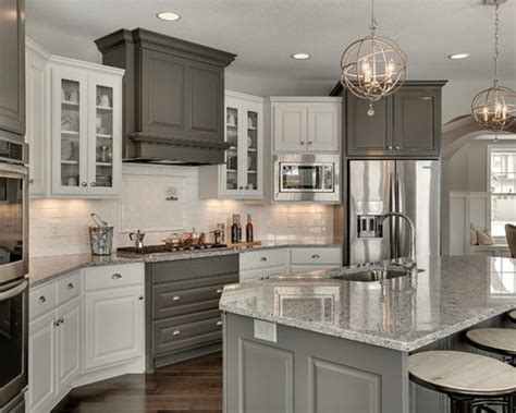 The sleek cabinets complement the clean edges of the appliances and granite countertops. Moon White Granite Home Design Ideas, Pictures, Remodel and Decor