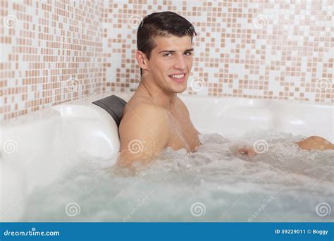 Young Man Relaxing In Hot Tub Stock Image Image 39229011