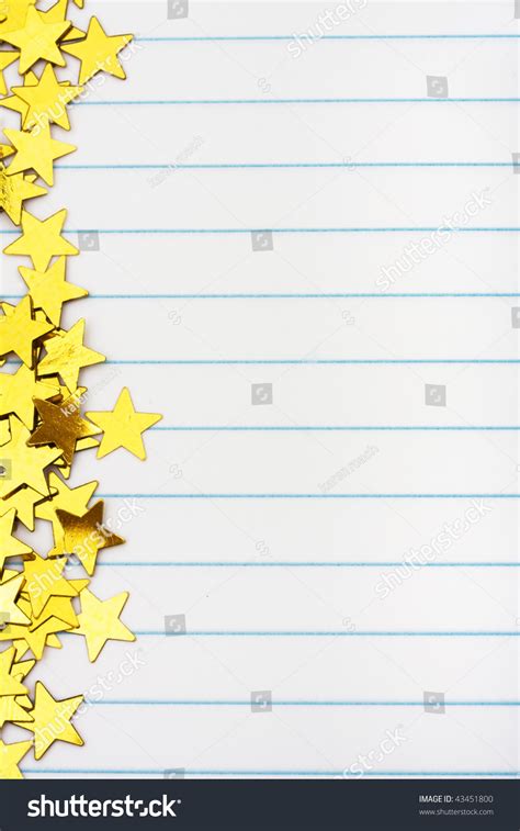 Gold Stars Making A Border On A Lined Paper Background Gold Star