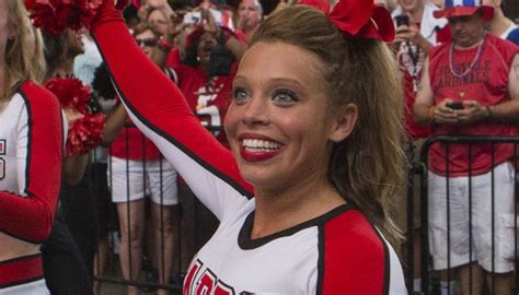 Head Coach Hails Cheerleader Found Dead In Apartment As Elite Athlete