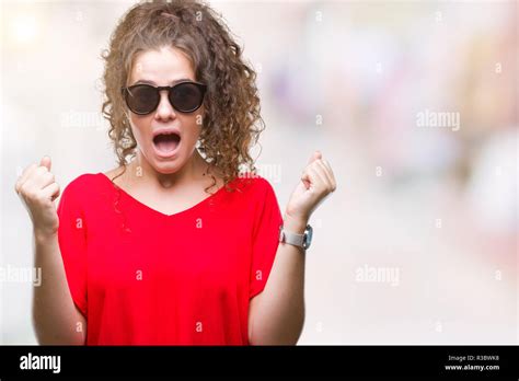 Beautiful Brunette Curly Hair Young Girl Wearing Sunglasses Over