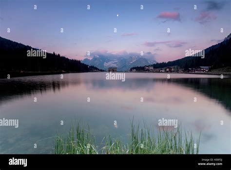 The Sorapiss Mountain Range Is Reflected In Lake Antorno At Sunrise