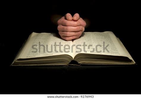 Mans Hands Clasped Prayer Over Bible Stock Photo 9276943 Shutterstock