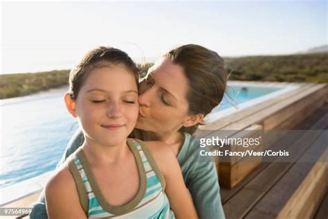 Sitting On Lap Kissing Photos And Premium High Res Pictures Getty Images
