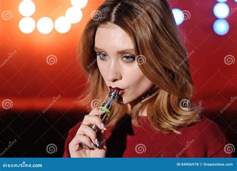 Pretty Girl Viper Smoke E Cigarette In A Nightclub Stock Photo Image